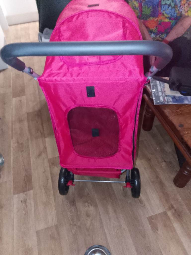 Red pet stroller 