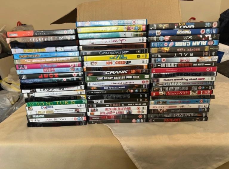 Large Selection of DVDs - Mixed Genres, Good Condition
