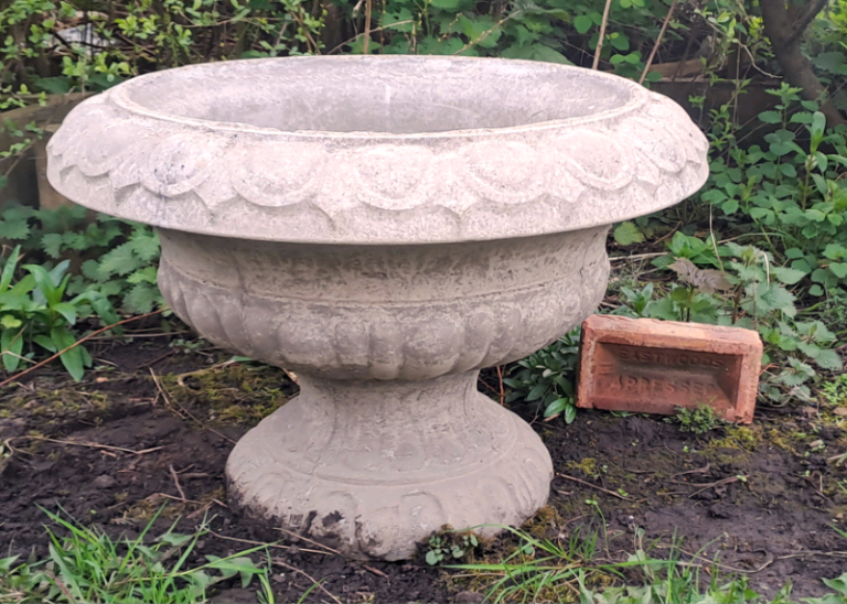 Huge stone garden urn planter pair available