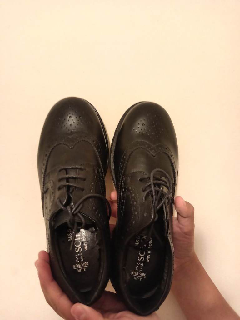 Black M&S school shoes. 