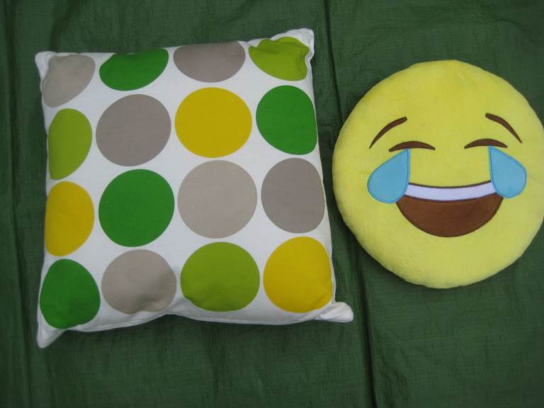 Large Ben de Lisi Cushion for £5.00; Round Smiley Face Cushion for £3.00; 2 for £7.00