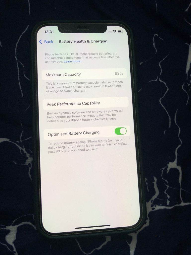 Apple iPhone 12 64gb unlocked looks nearly new iOS 26.3 battery health 82% original battery 