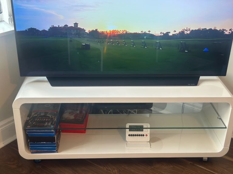 White TV Unit/Stand with Glass Shelf – Good Condition