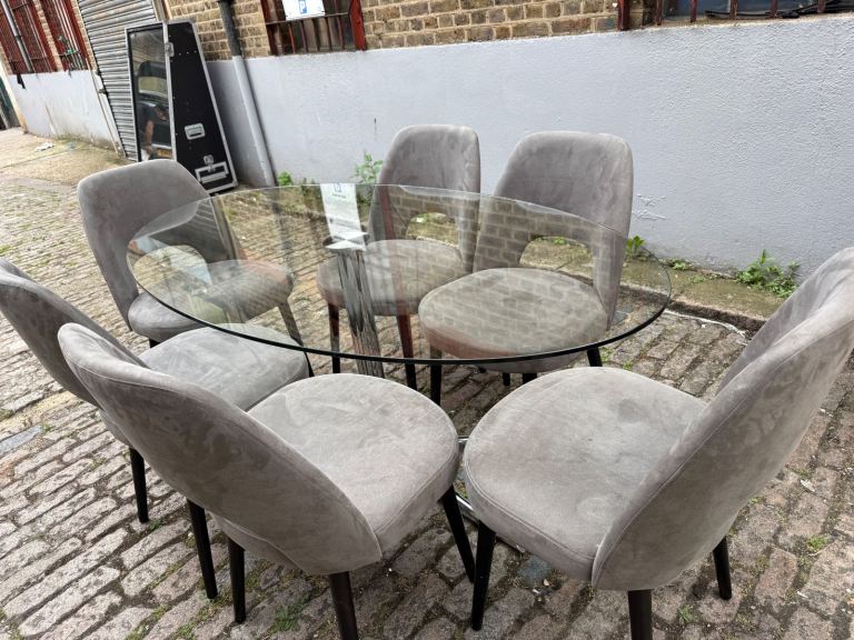 Bentley design dining chairs and Oval glass dining table + local delivery 