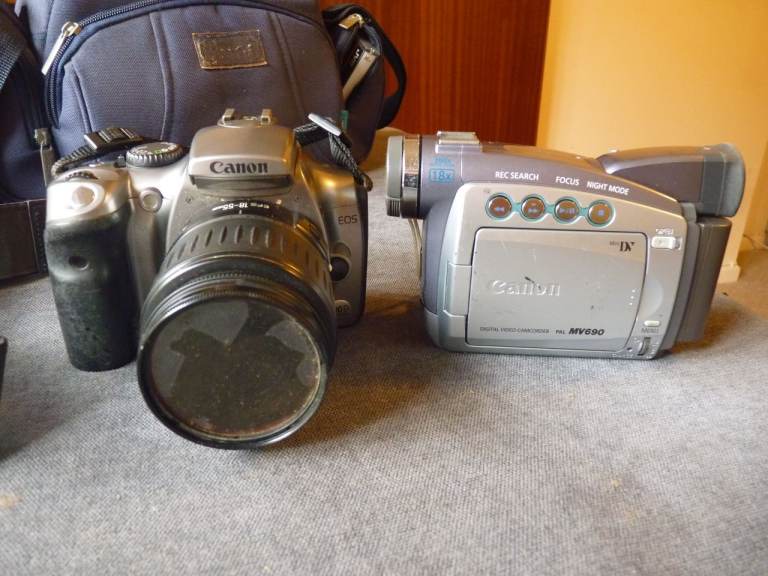 Canon EOS 300D digital SLR/Canon MV690 Camcorder/Panasonic VHS movie camera/Sharp 8XZoom camcorder