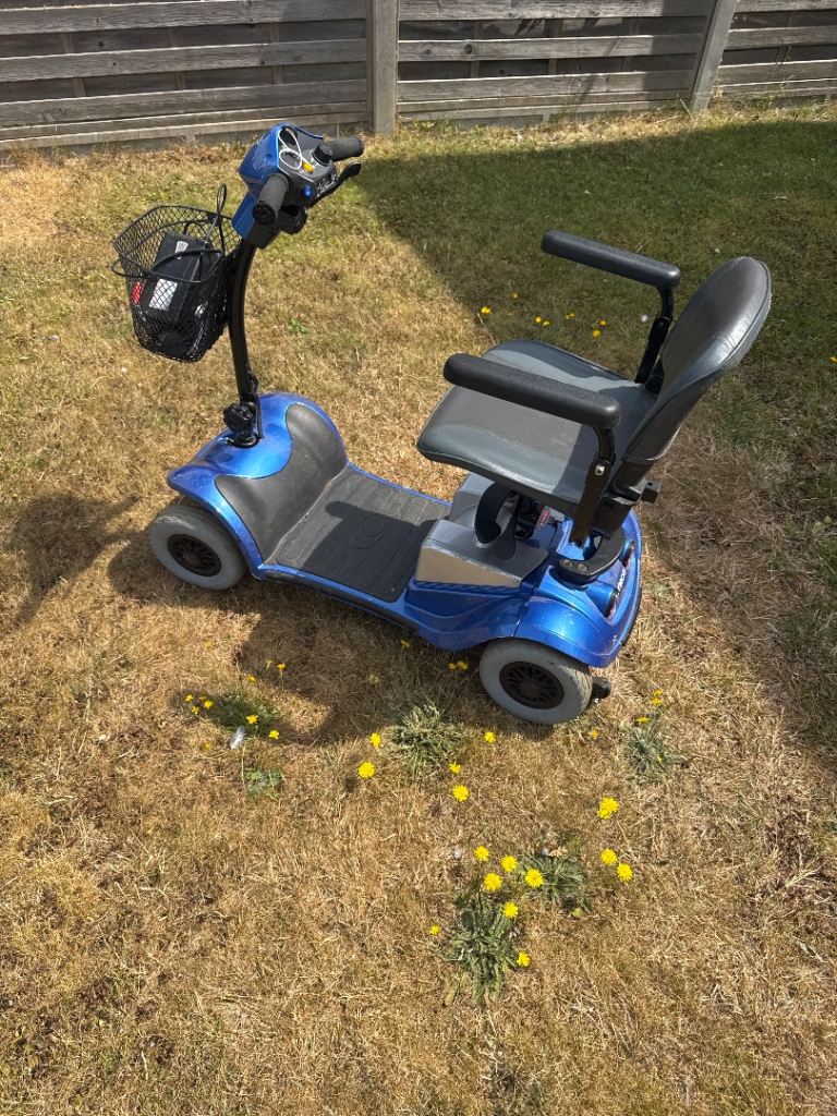 Blue Mobility Scooter with Basket – Good Condition