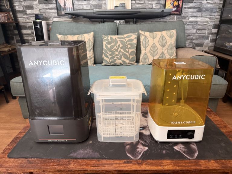 Any cubic  3d printer and wash/uv bath 