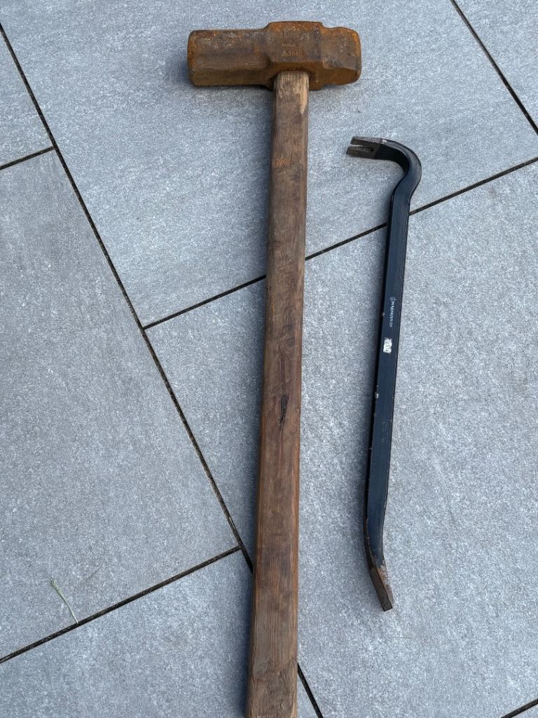 Big hammer, crowbar, and bench
