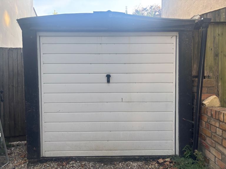 Prefabricated garage with up and over garage door