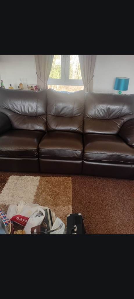 Three seater leather sofa brown