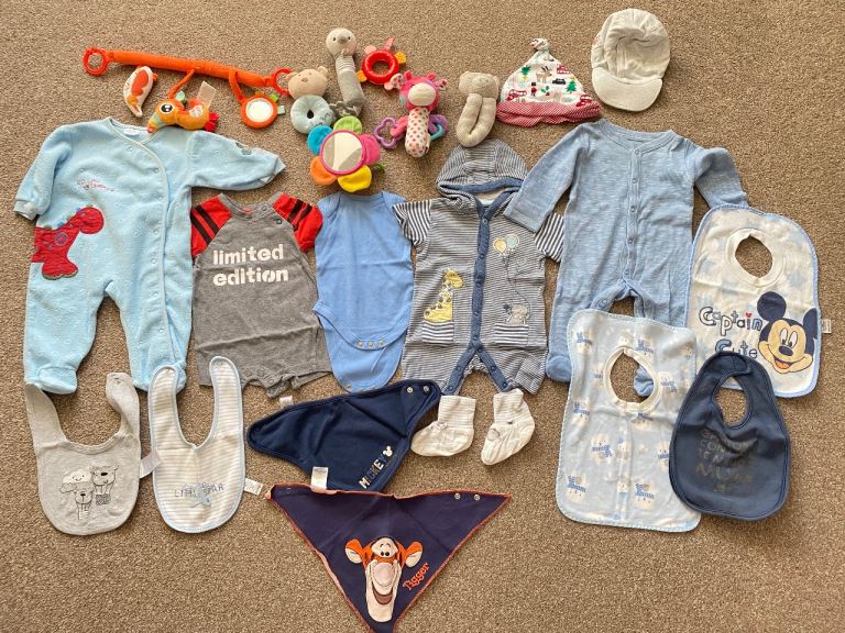 Bundles of baby clothes 