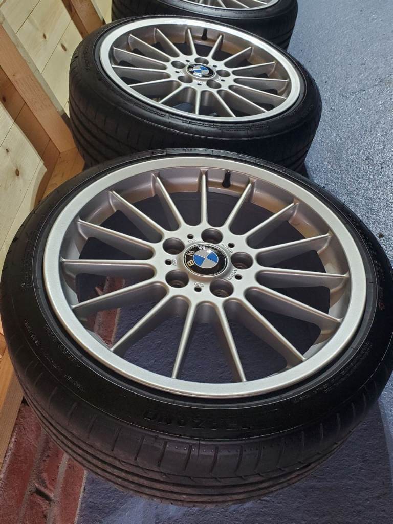 Genuine BMW style 32 alloy wheels 18 inch new tyres and center caps 