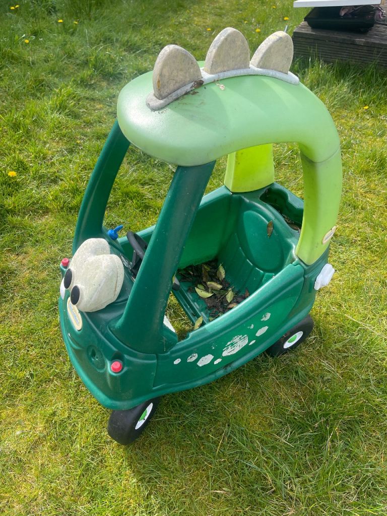 Green Ride-On Dino Car – Well-Used but Fun