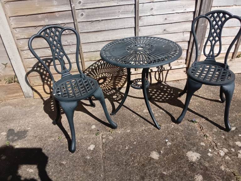 Garden table and two chairs