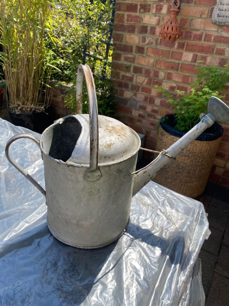 Galvanised metal watering can 
