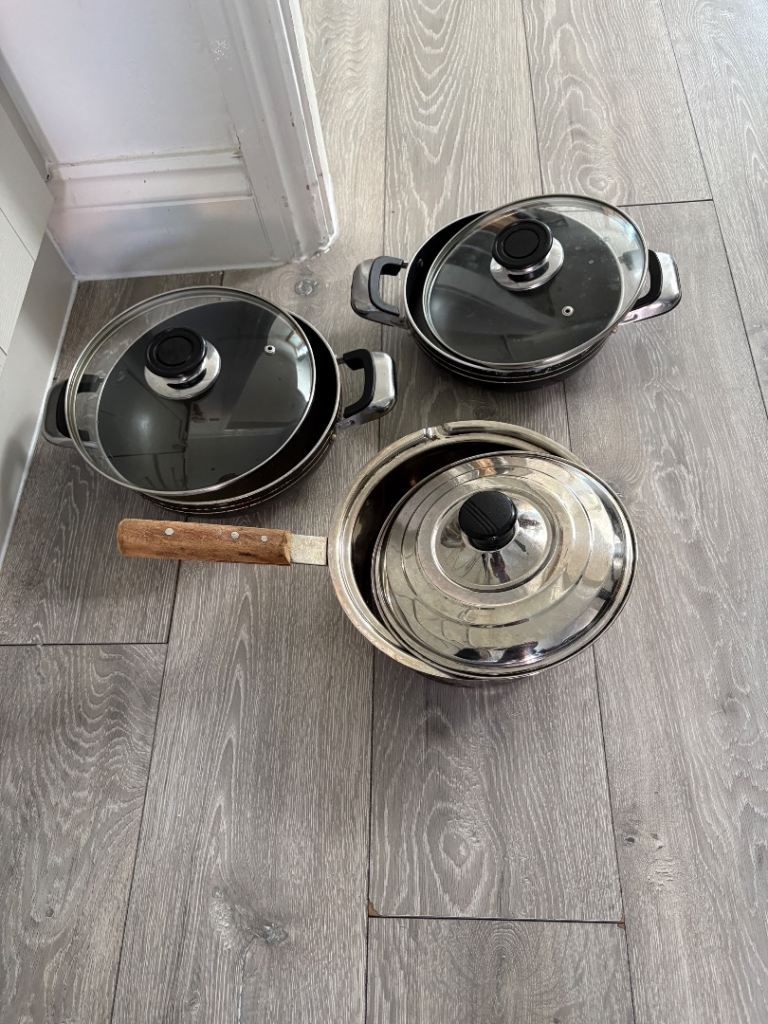 2 nonstick and one steel pot, good used condition SL2 Slough cash only 
