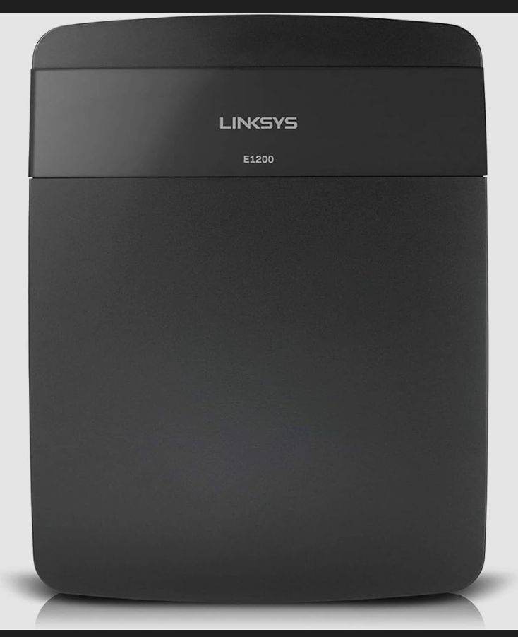 Linksys E1200 Wi-fi Router WiFi router Power adapter and ethernet cable included