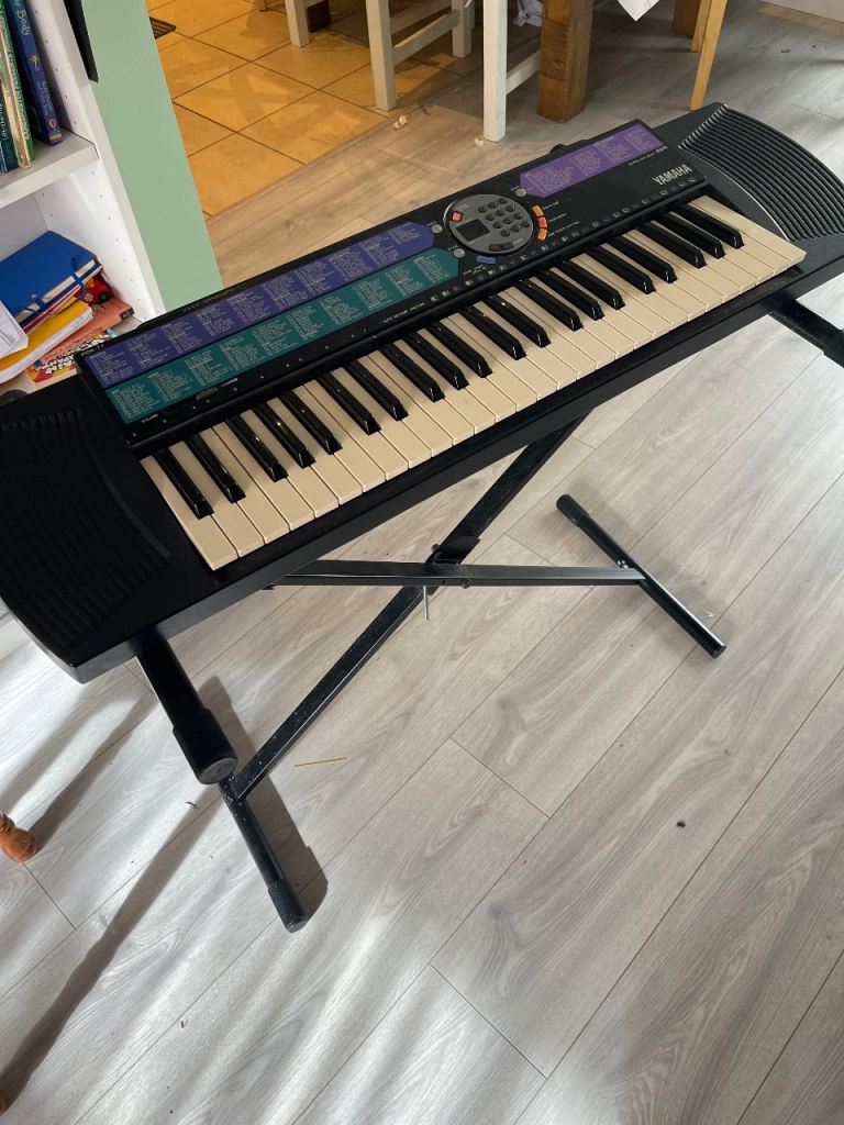 Yamaha Electronic Keyboard with Stand – Good Condition