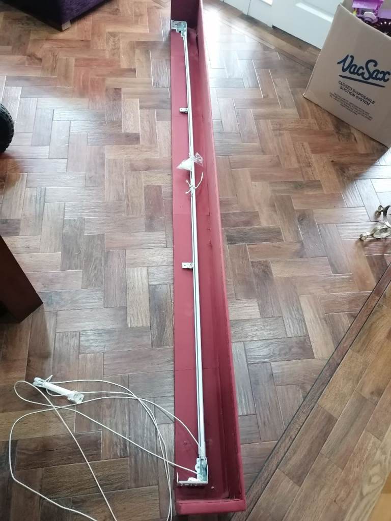 Pelmet with corded curtain rail