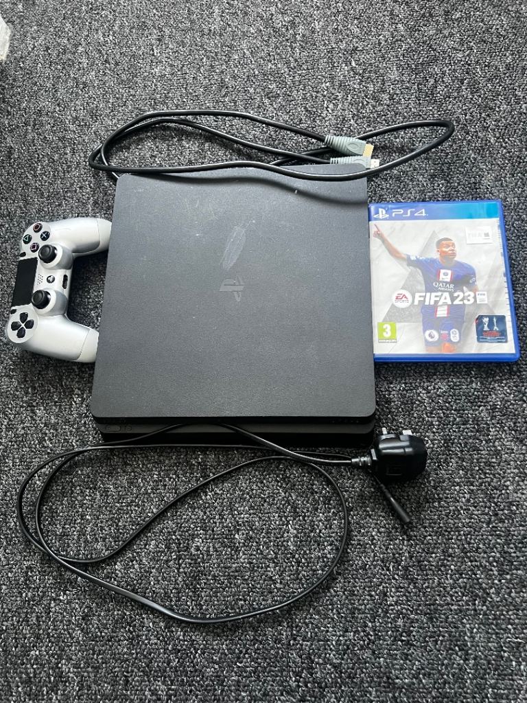 Sony PS4 Console with Controller and FIFA 23 Game