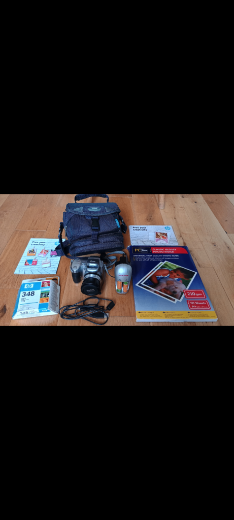 Kodak digital camera+photo/print accessories.