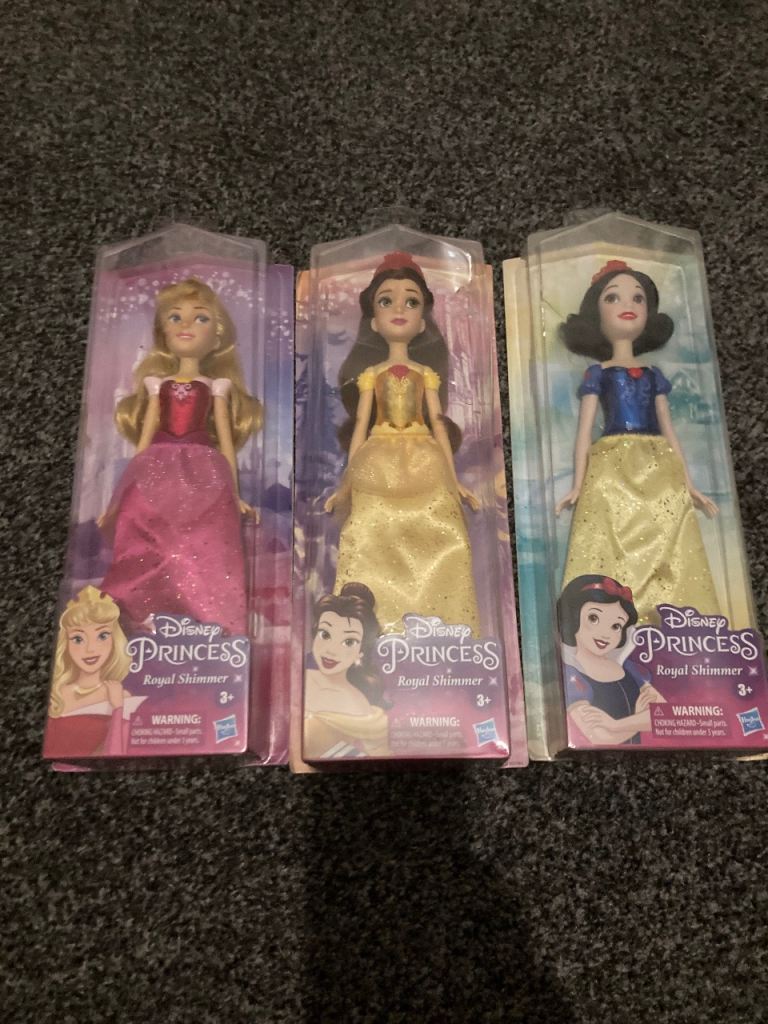 Disney dolls 3 brand new all unopened can deliver for a small charge