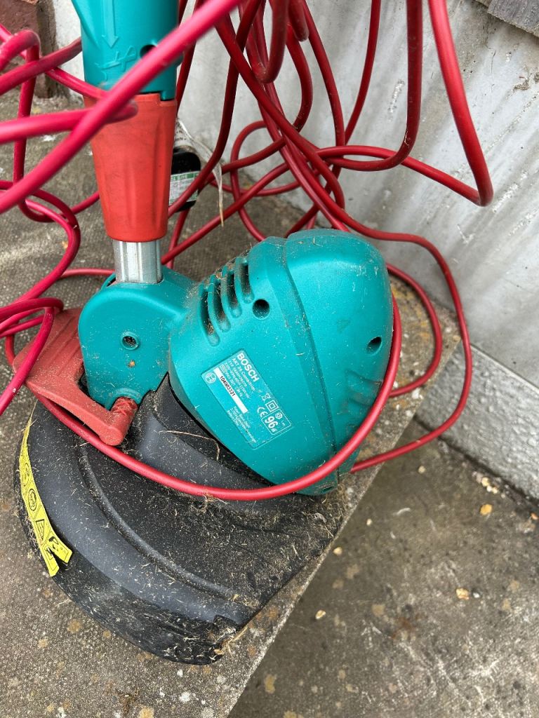 Lawn strimmer.