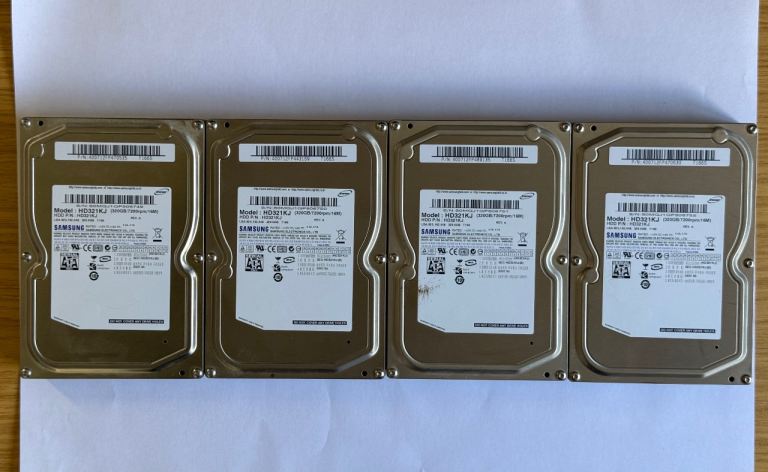 Four Matching Computer 320GB Internal Hard Drives and cables