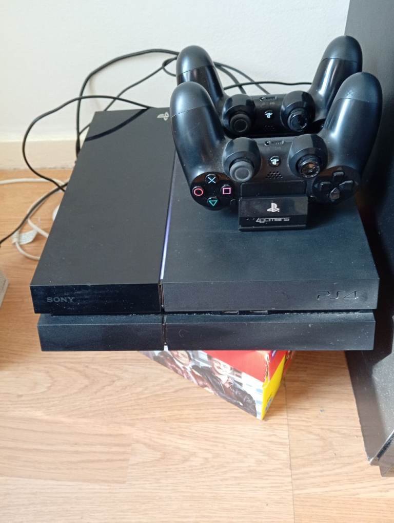 Sony PlayStation 4 (PS4) Console with Two Controllers
