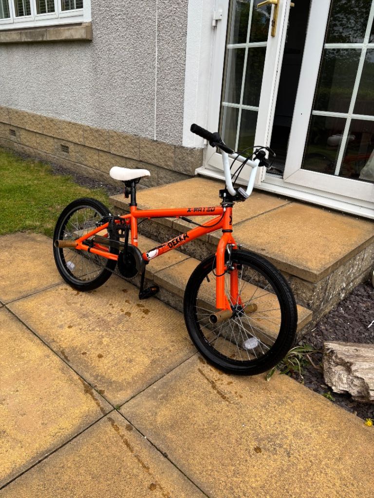 BMX Orange with white & black accents & Gold Pegs 