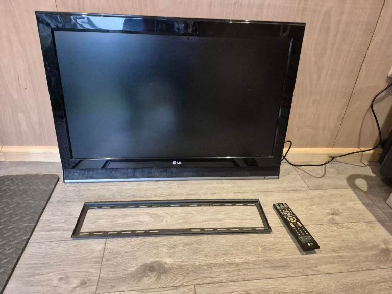 37" LG TV and wall bracket