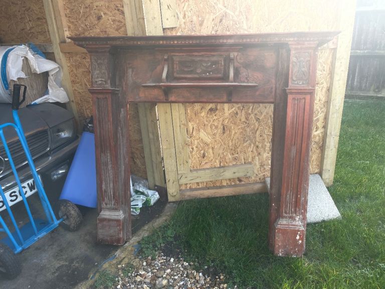 Large period carved hardwood fire surround 