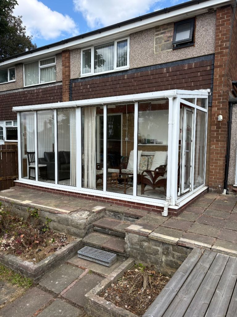White UPVC Conservatory with Sliding Door – Good Condition