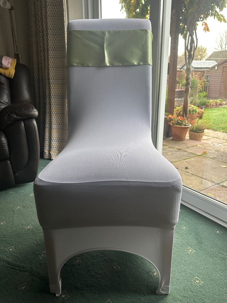 Wedding party chair covers and green sashes. 60 pieces