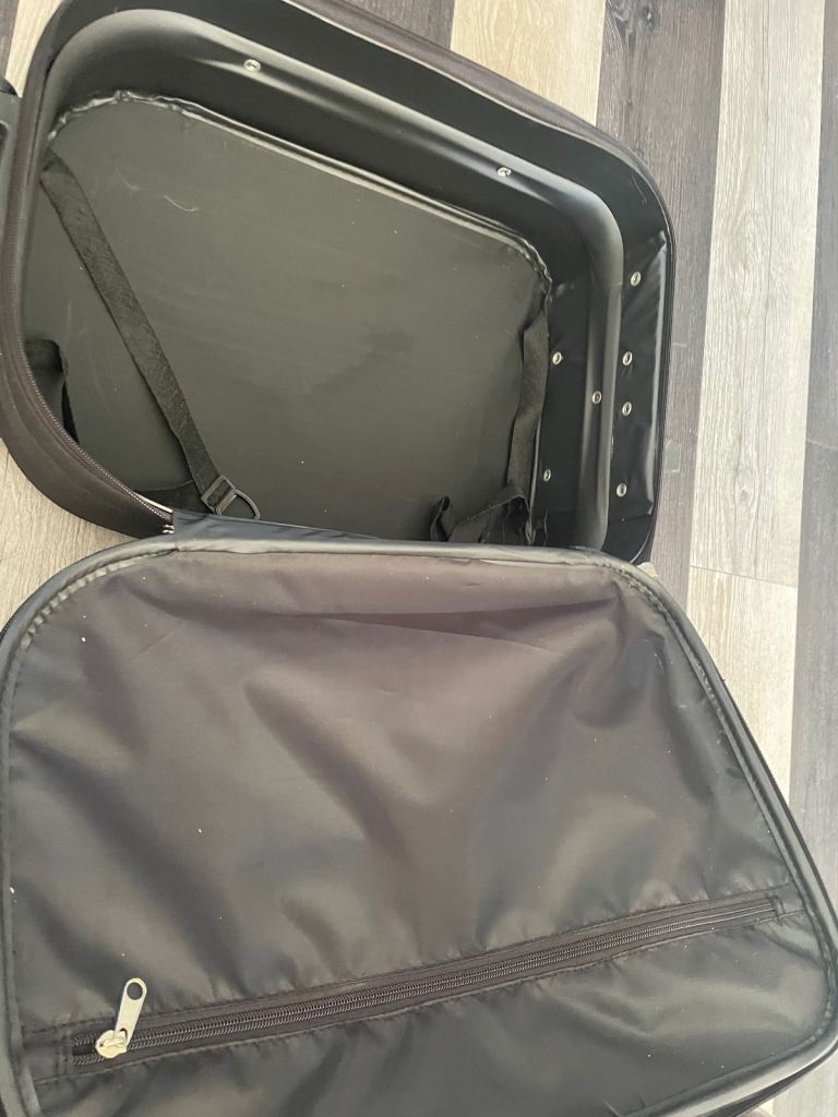 Black zebra suit case 