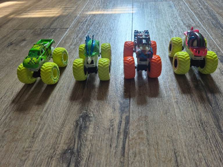 4 x Hot Wheels Glow in Dark Monster Jam Trucks 1:64 size