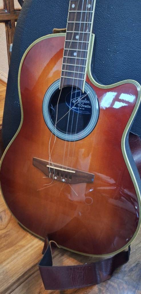 Electric/acoustic guitar, model AE138. Approx 20 years old. with hard case
