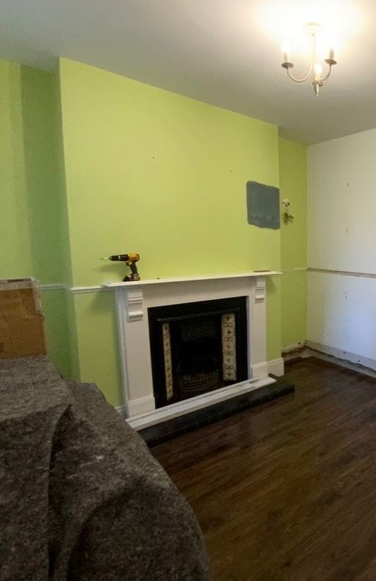 Victorian tiled fireplace with original slate mantlepiece surround