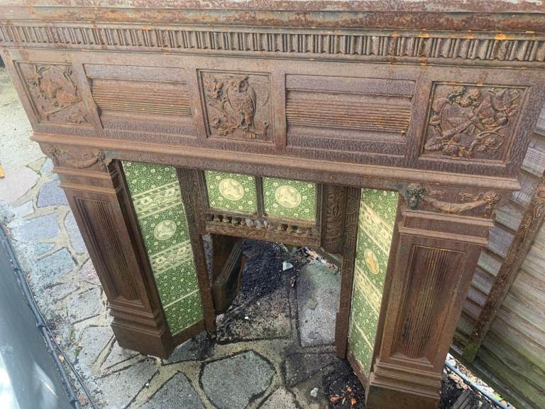 Antique 1906 Cast Iron Fireplace with unusual wildlife detailing inc. owl, butterfly, bat