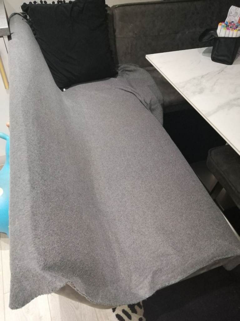 Table with corner chair, sofa and bench