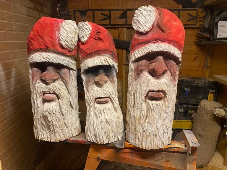 Santa log carvings 