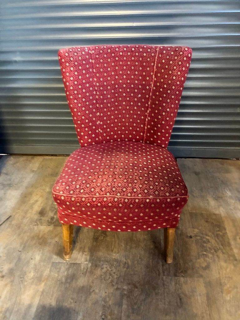 Winged back Upholstered Chair with wooden legs 