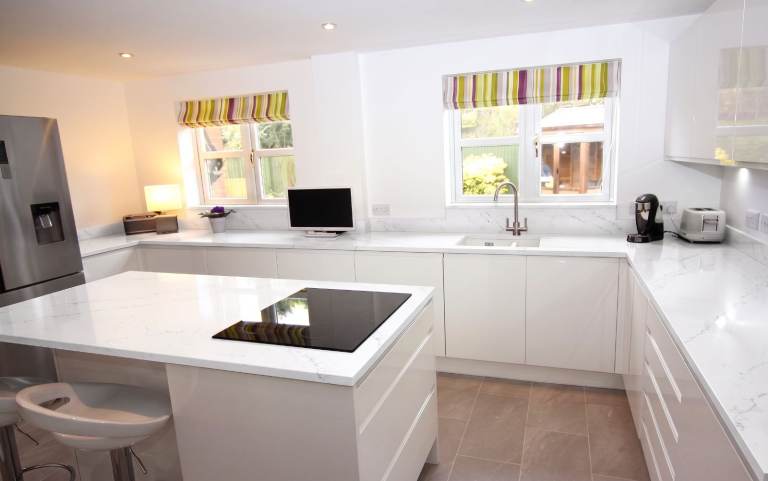 Wren Luxury Laminate Kitchen Worktops and TekWall in Carrara Bianco Gloss. Brand New