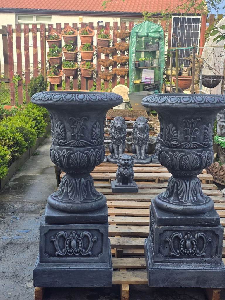 Garden decorations: concrete planters with 3-foot bases 