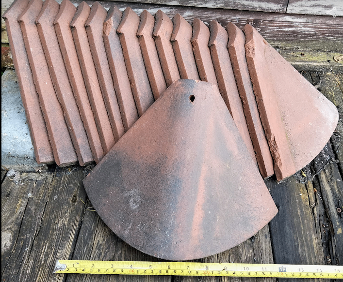 16 Clay Bonnet Hip Tiles  Width 31cm  A bargain £20 for the lot