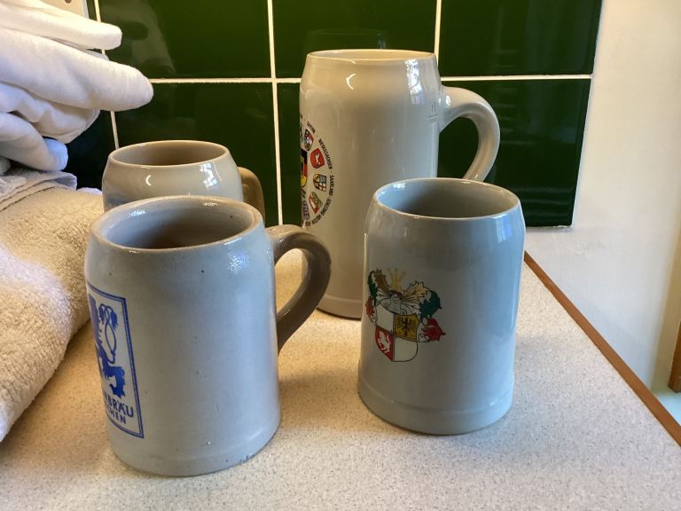Set of 4 German-Themed Ceramic Mugs – Good Condition