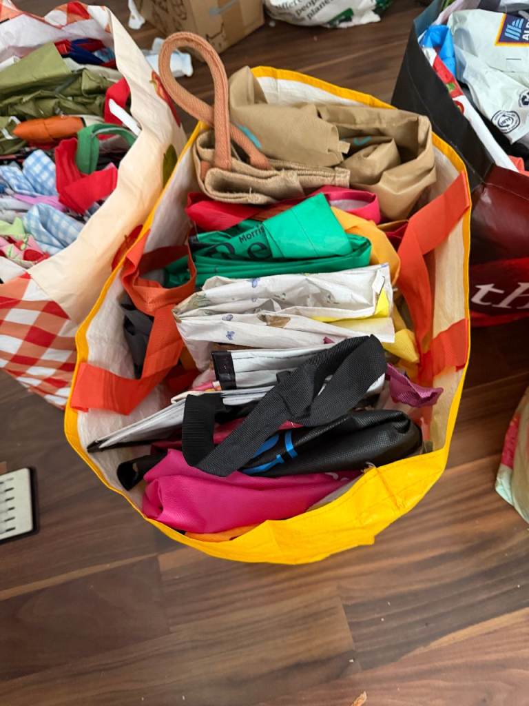 Reusable shopping bags, around 300- 400 all only used once