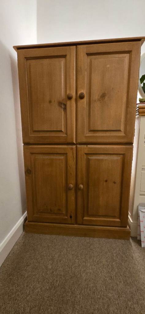 Solid pine computer cupboard.