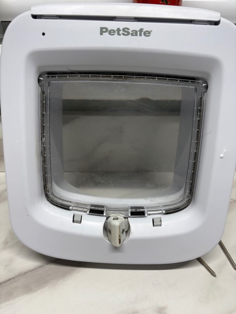 Postage cat flap