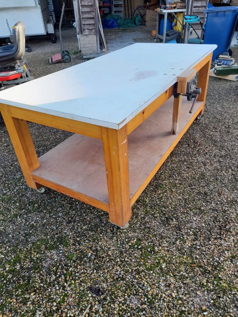Large workbench/packing bench with vice.